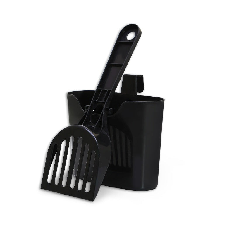 Front view of a black litter scoop and matching holder on a pale background.
