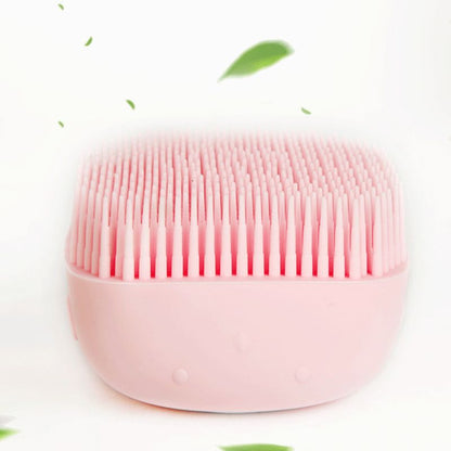 Close-up of pink pet bath brush bristles
