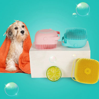 Blue, pink and yellow silicone pet bath brushes beside a wet dog