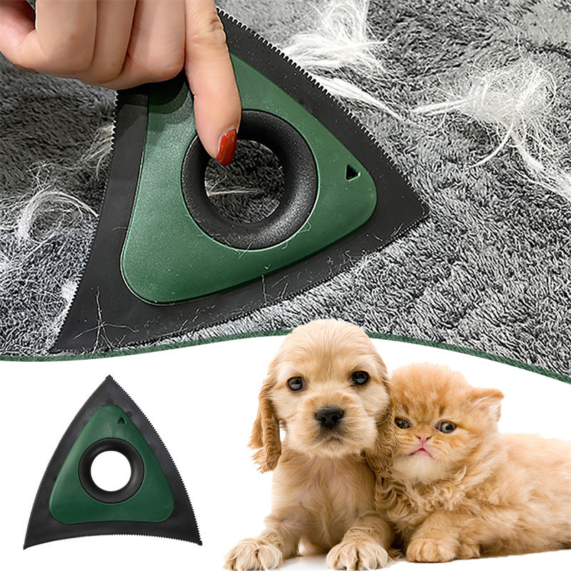 Green tri-edge scraper gathering loose pet hair from carpet