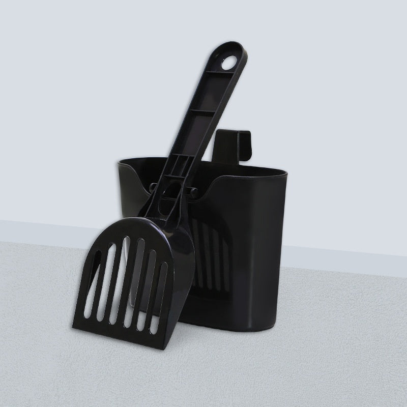 Black litter scoop and holder set on a neutral background