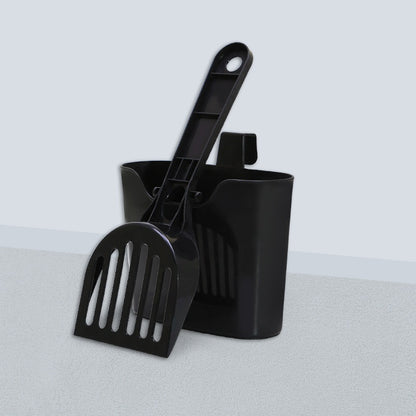 Black litter scoop and holder set on a neutral background