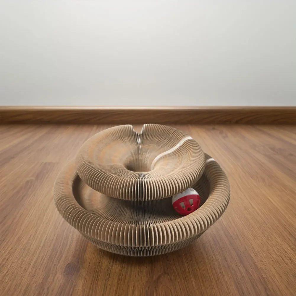 Brown accordion cat scratcher arranged in two connected circular tiers on a wood floor.