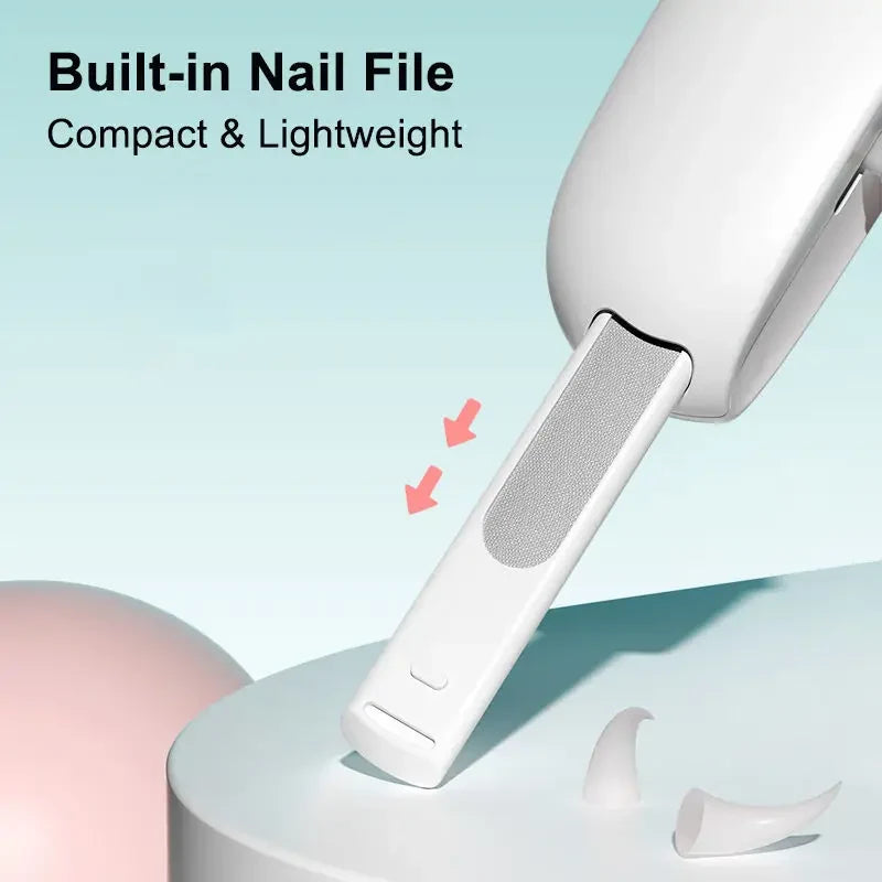 Close-up of the slide-out nail file on the blue and white pet nail clippers.