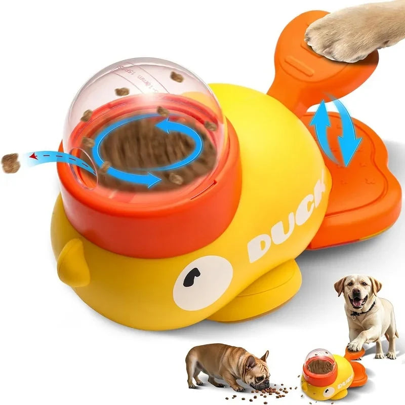 Yellow duck-shaped manual treat dispenser with a clear treat container and orange side controls.