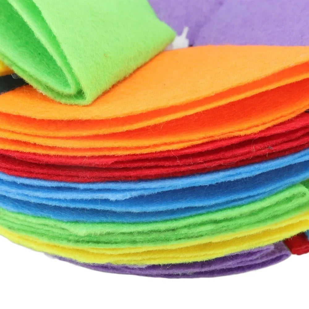 Close-up of the colored felt layers on the rainbow foldable snuffle ball.