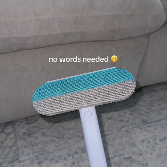 Supplier video showing the blue and gray long-handle pet hair removal tool used on a sofa and rug.