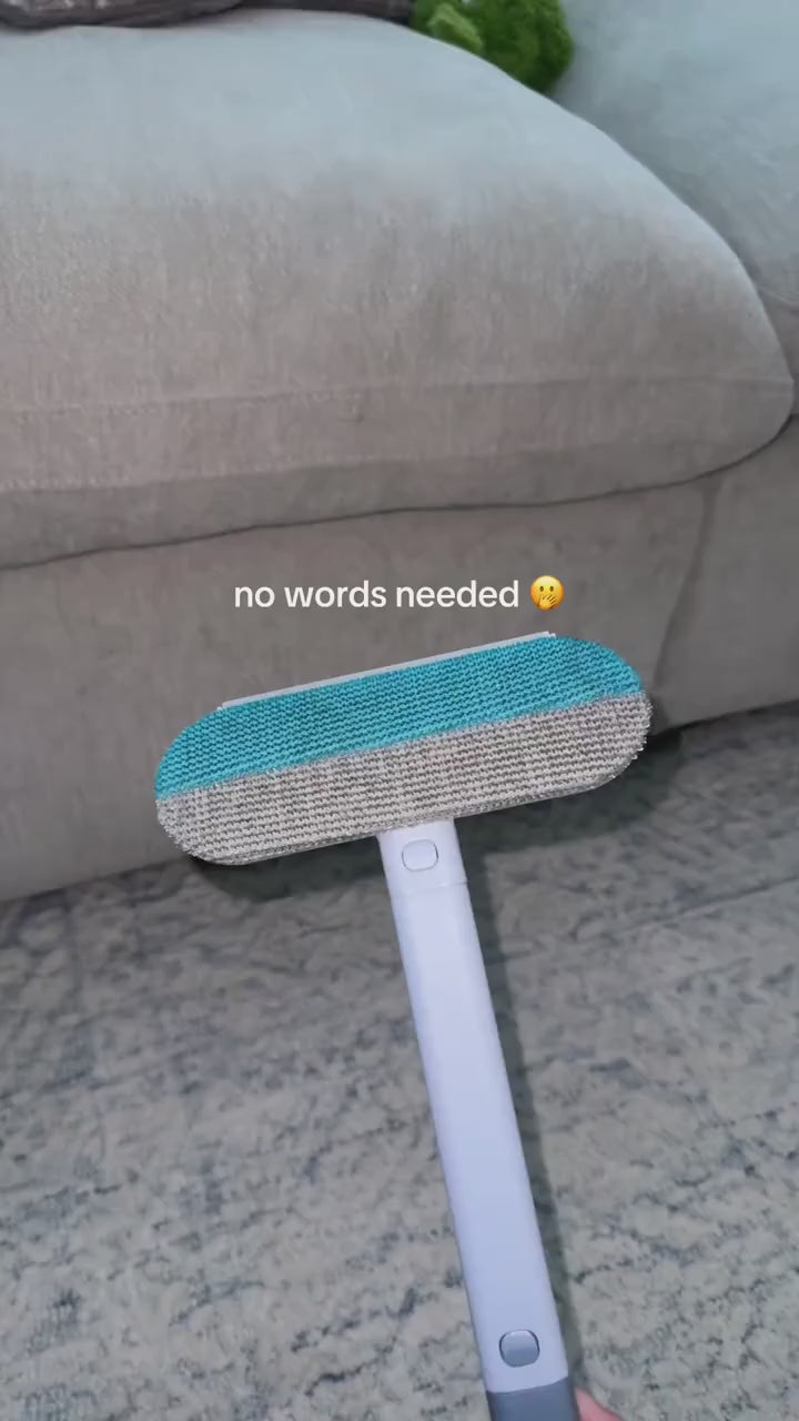 Supplier video showing the blue and gray long-handle pet hair removal tool used on a sofa and rug.