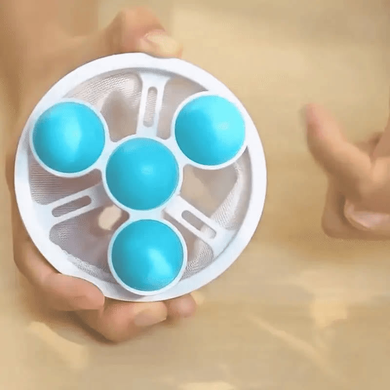 Close-up demonstration of the pet hair catcher's floating frame and mesh pouch